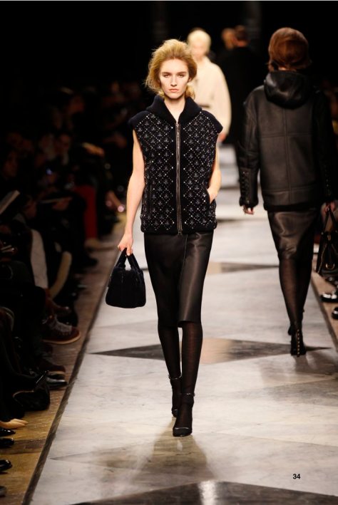 34-LOEWE-AH-2013-Navy Embroidered Shearling Hooded Gilet Navy Napa Skirt_ Black and Navy Pierced Napa Sandal_ Navy Embroidered Shearling ‘Amazona 28’ Bag