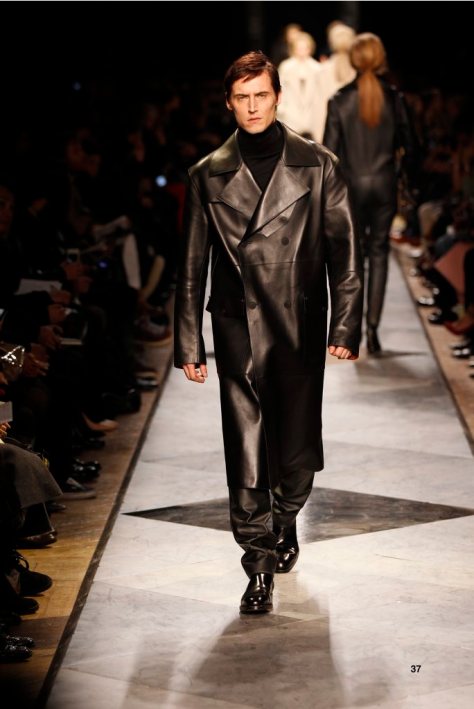37-LOEWE-AH-2013-Black Bonded Napa Trench_ Black Cashmere High-neck Jumper_ Black Napa Trousers_ Black Leather Chelsea Boot